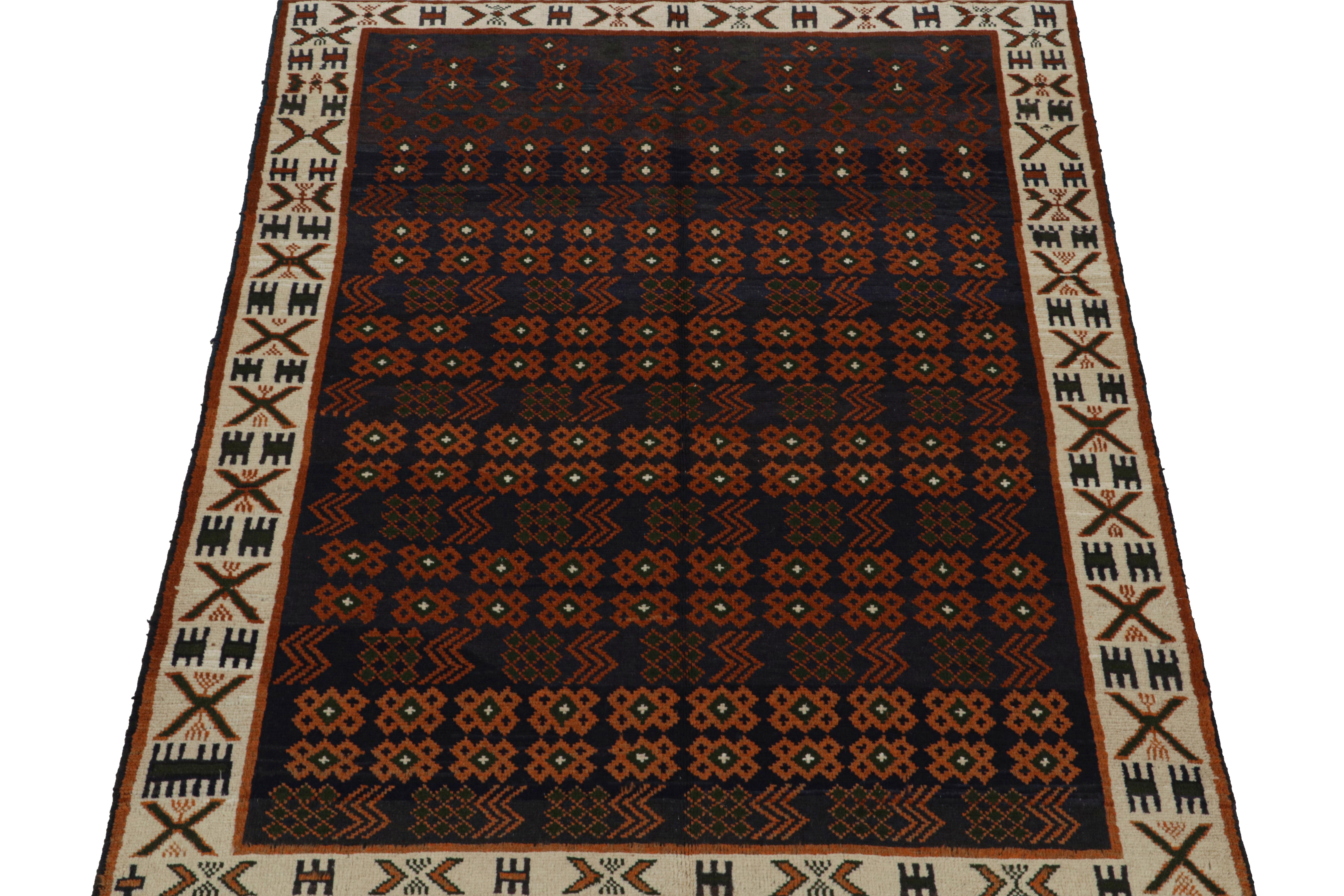 Tribal Rug & Kilim’s Oushak style rug in Blue with Rust Orange Geometric Patterns For Sale