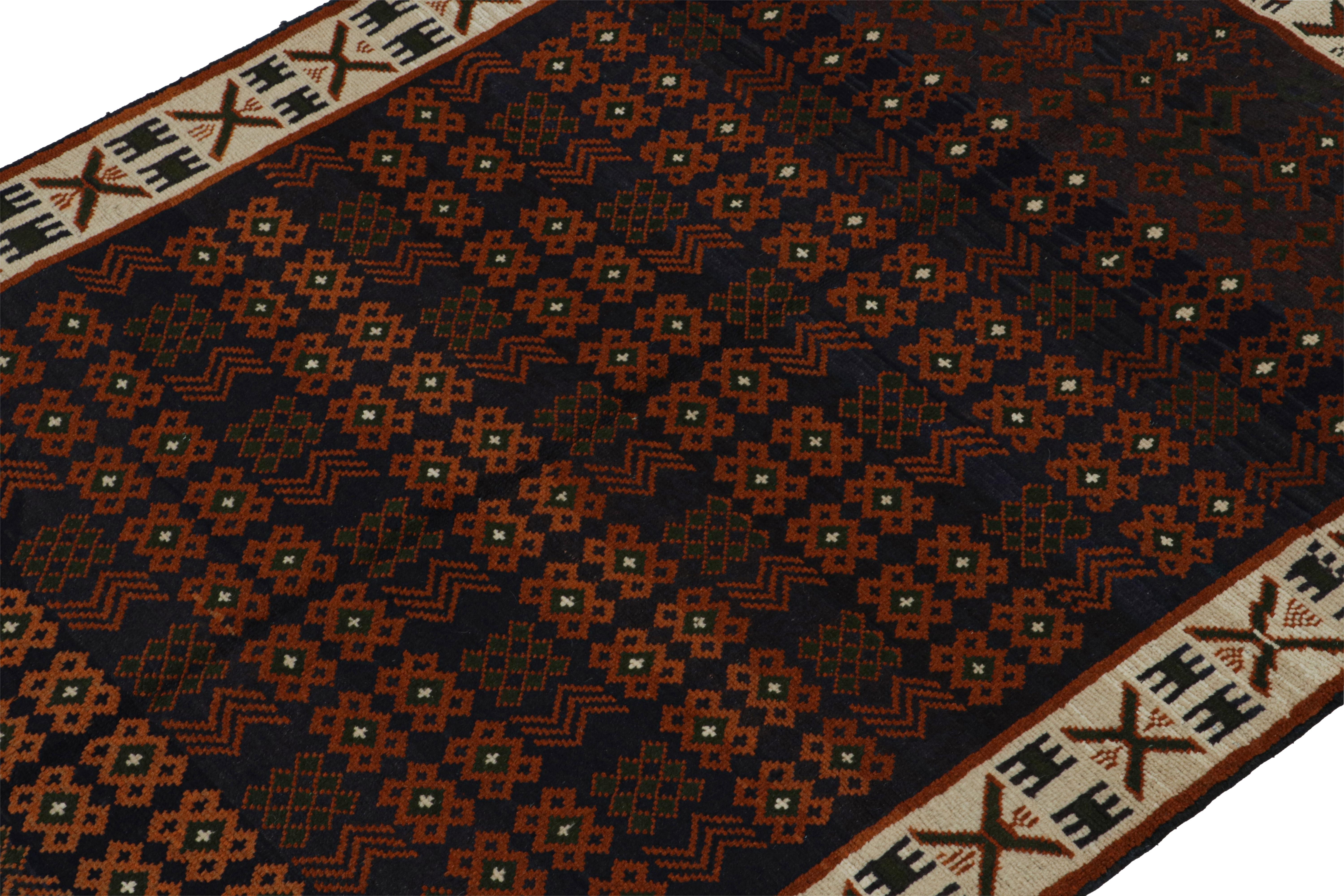 Afghan Rug & Kilim’s Oushak style rug in Blue with Rust Orange Geometric Patterns For Sale