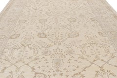 Rug & Kilim - Tappeto in stile Oushak nei colori crema, grigio e avorio con motivi floreali geometrici