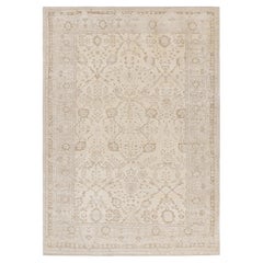 Rug & Kilim - Tappeto in stile Oushak nei colori crema, grigio e avorio con motivi floreali geometrici
