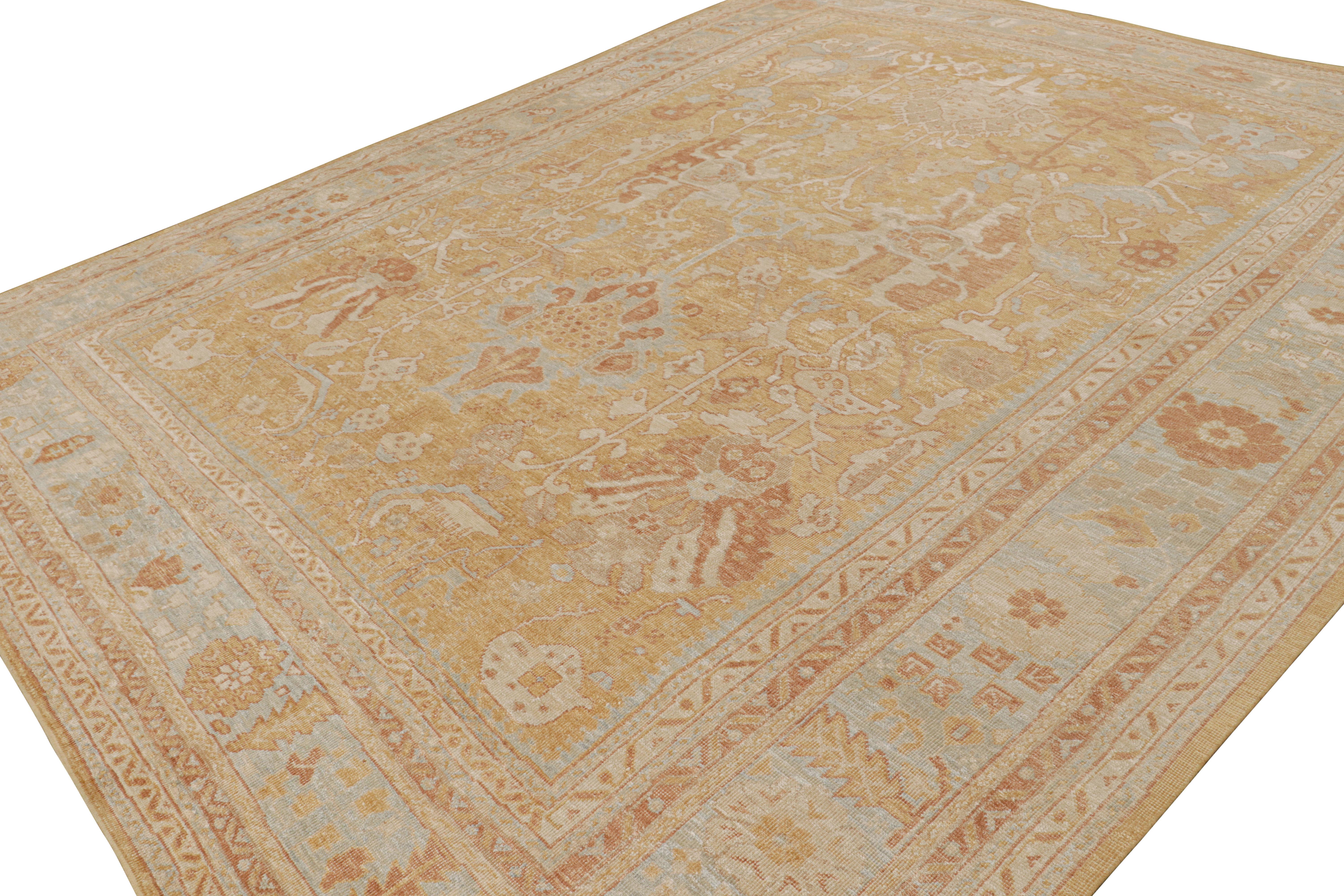 This 12x15 rug from the Modern Classics Collection features a gold field, blue and beige-brown borders underscore geometric-floral patterns keeping with the Oushak style. 

On the design: 

Connoisseurs will admire that this rug is made with a new