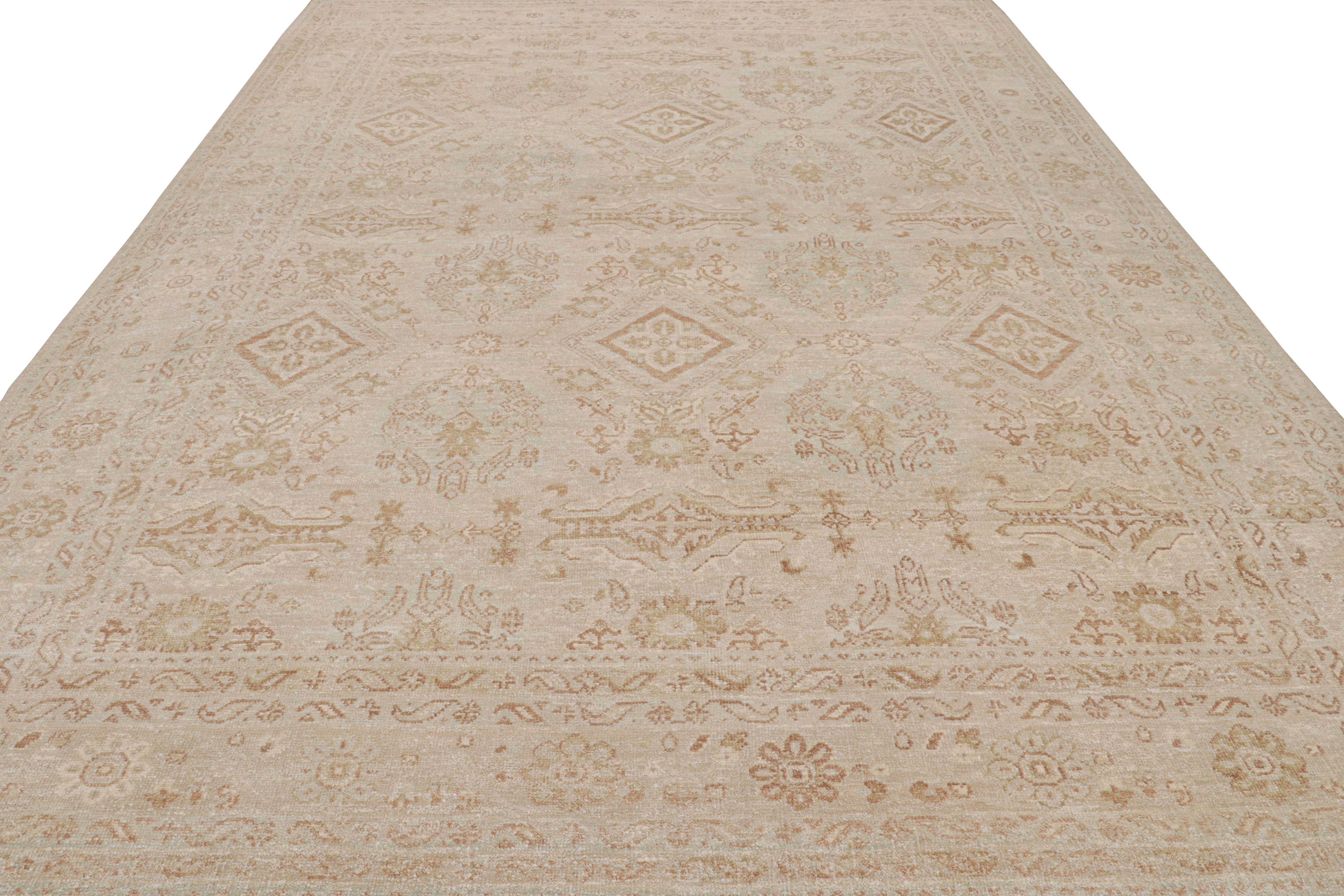 This 10x14 rug from the Modern Classics Collection by Rug & Kilim features beige tones underscore gold and ivory geometric patterns. 

On the design: 

Connoisseurs will admire that this rug is made with a new yarn Josh Nazmiyal is introducing,