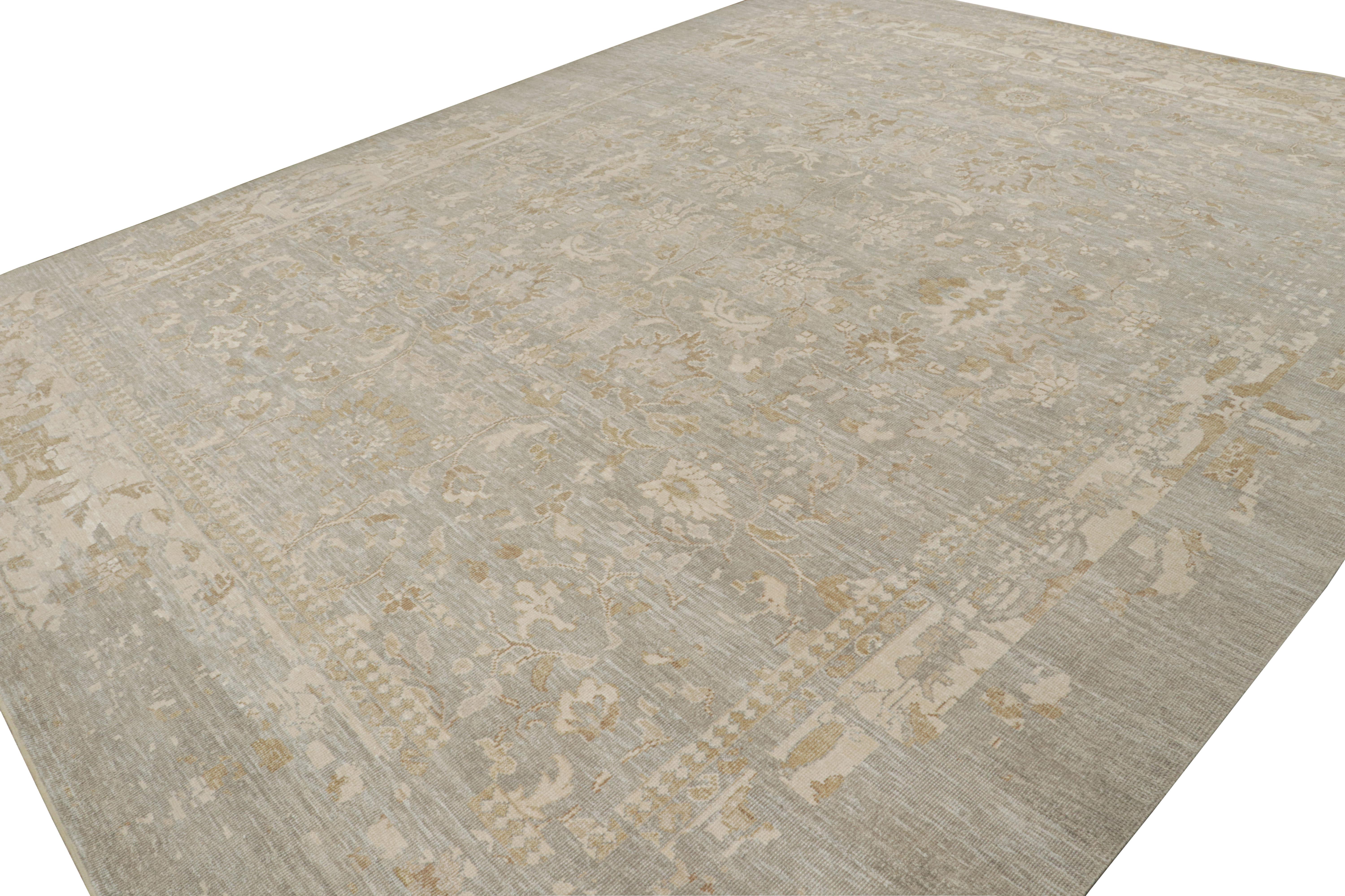 This 12x15 rug is inspired by antique Oushak rugs—from a bold new Modern Classics Collection by Rug & Kilim. Hand-knotted in silk, it enjoys grey & beige-brown floral patterns.

On the Design:

This new line is made with a new yarn Josh Nazmiyal is