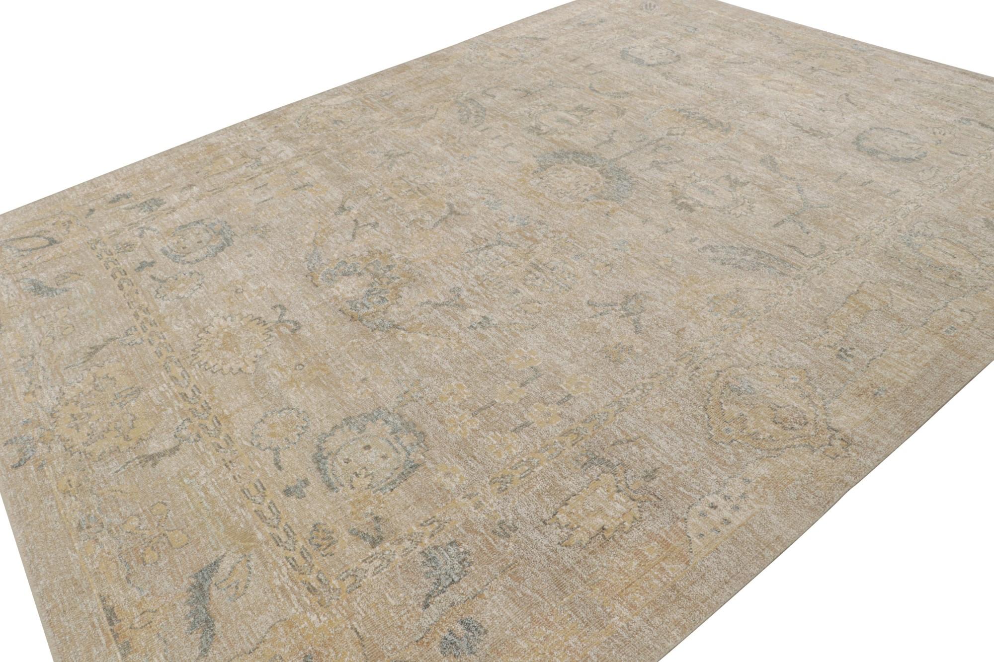 This 9x12 rug from the Modern Classics Collection by Rug & Kilim is from a new line inspired by antique Oushak rugs. Hand-knotted in wool & sari silk, its design enjoys beige, gold & gray floral patterns.  

On the Design: 

The rug is made with a