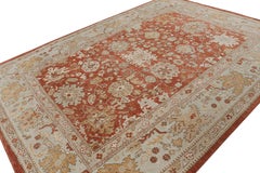 Rug & Kilim’s Oushak style rug in Red, Blue & Brown Floral Patterns