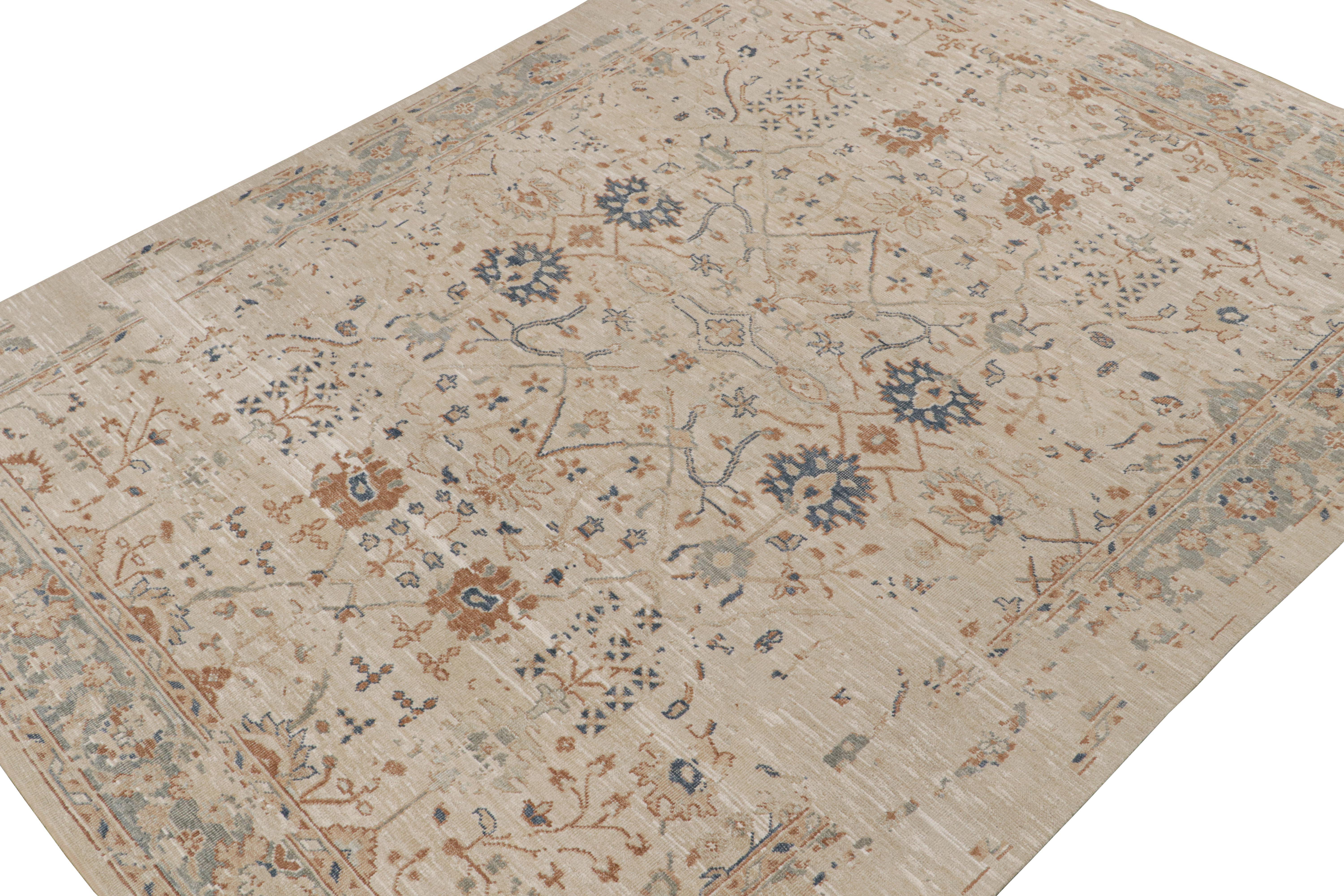This 9x12 rug is inspired by antique Oushak rugs—from a bold new Modern Classics Collection by Rug & Kilim. Hand-knotted in silk, it enjoys taupe and beige-brown undertones with tribal motifs and floral patterns in rust tones and navy blue. 

On the