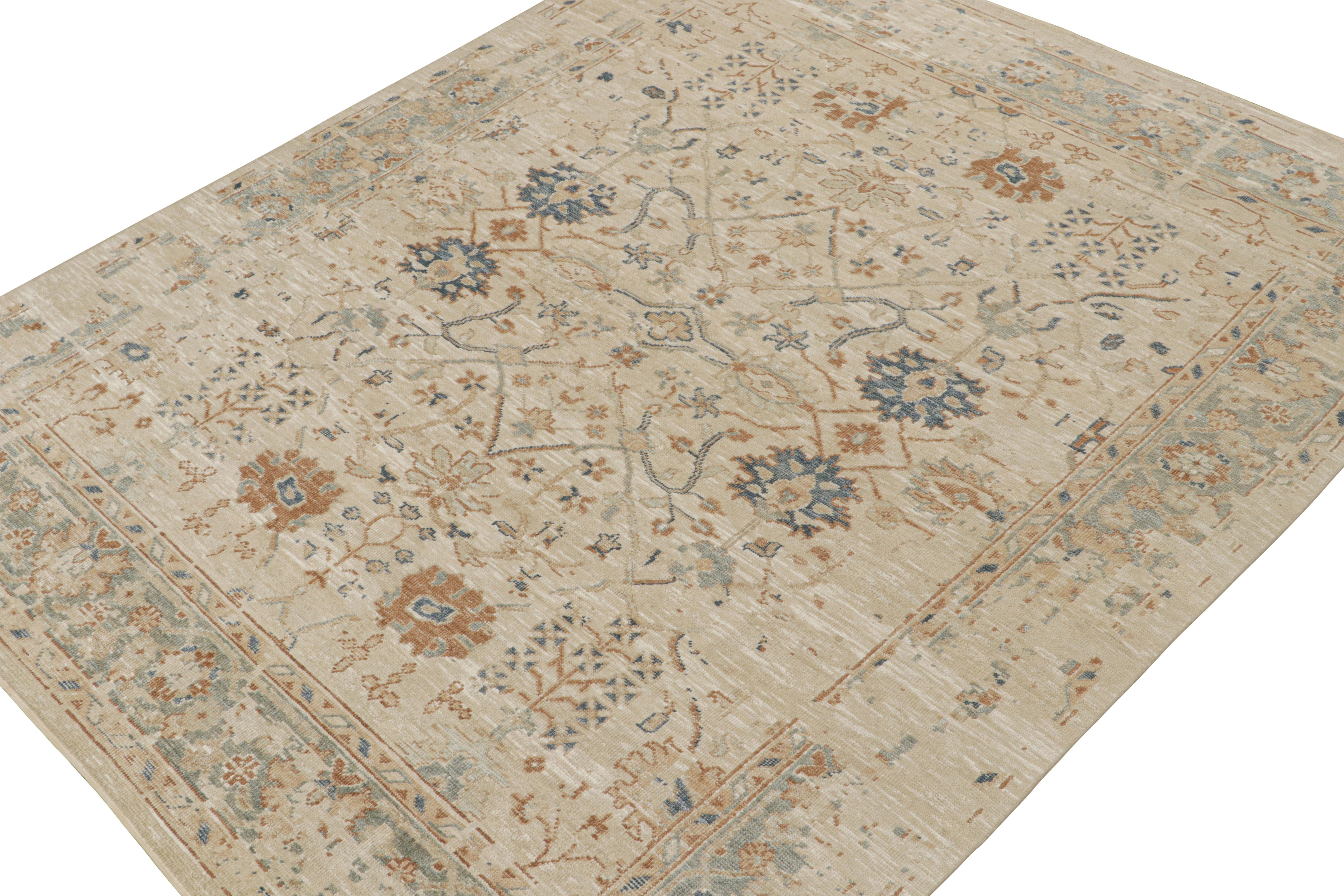 This 8x10 rug is inspired by antique Oushak rugs—from a bold new Modern Classics Collection by Rug & Kilim. Hand-knotted in silk, it enjoys taupe and beige-brown undertones with tribal motifs and floral patterns in rust tones and navy blue. 

On the