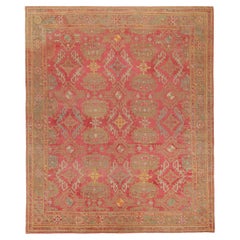 Tapis transitionnel de style Oushak de Rug & Kilim en rouge avec motifs géométriques bruns