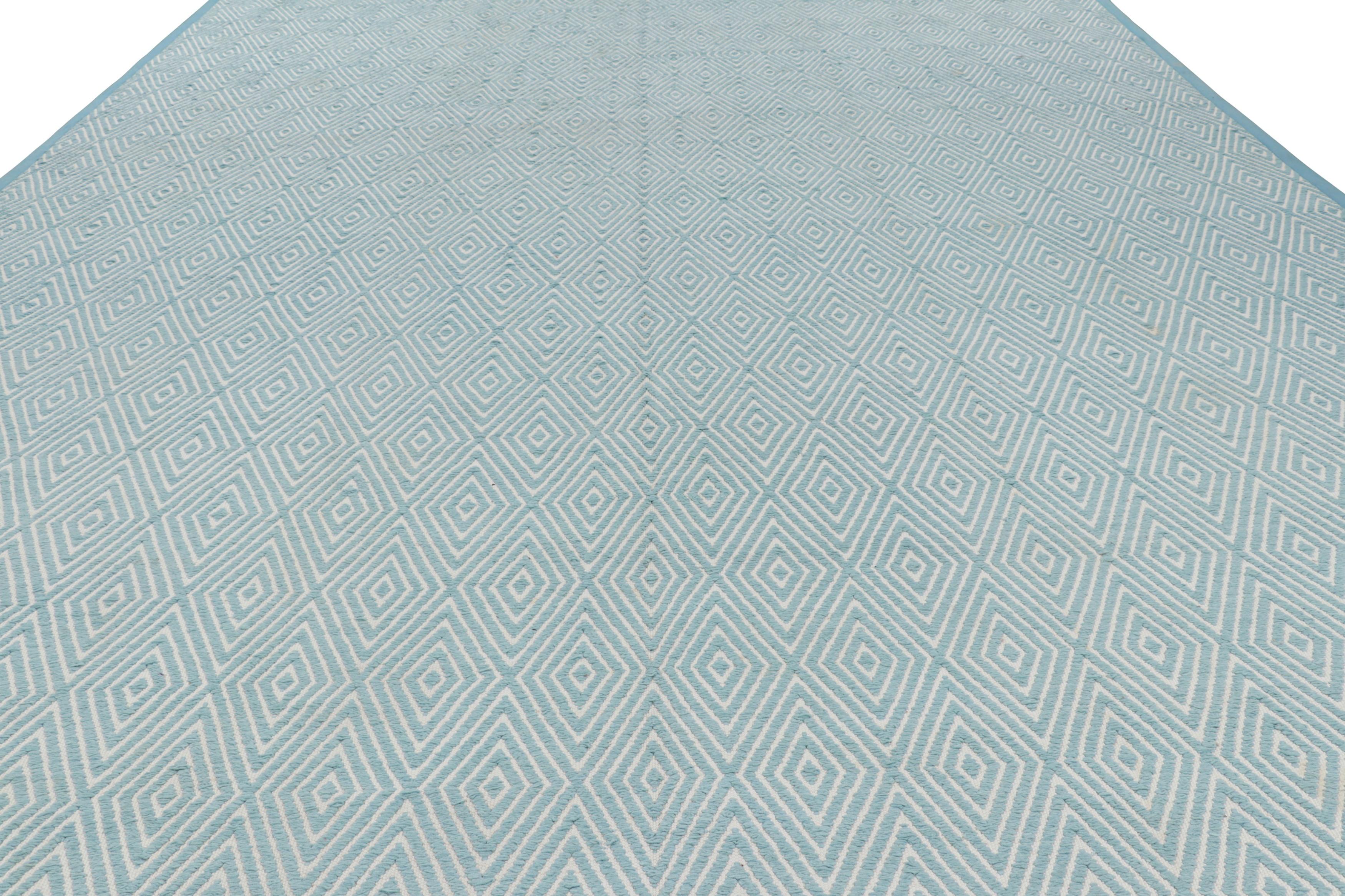 This Oversized 12x16 Chenille Rug is a new addition to the Modern collection by Rug & Kilim—made with cotton in a high-and-low texture. 

On the Design

This particular rug enjoys an off-white field underscored by light blue geometric patterns—a