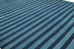 Rug & Kilim’s Oversized Contemporary Dhurrie Rug in Blue Stripes