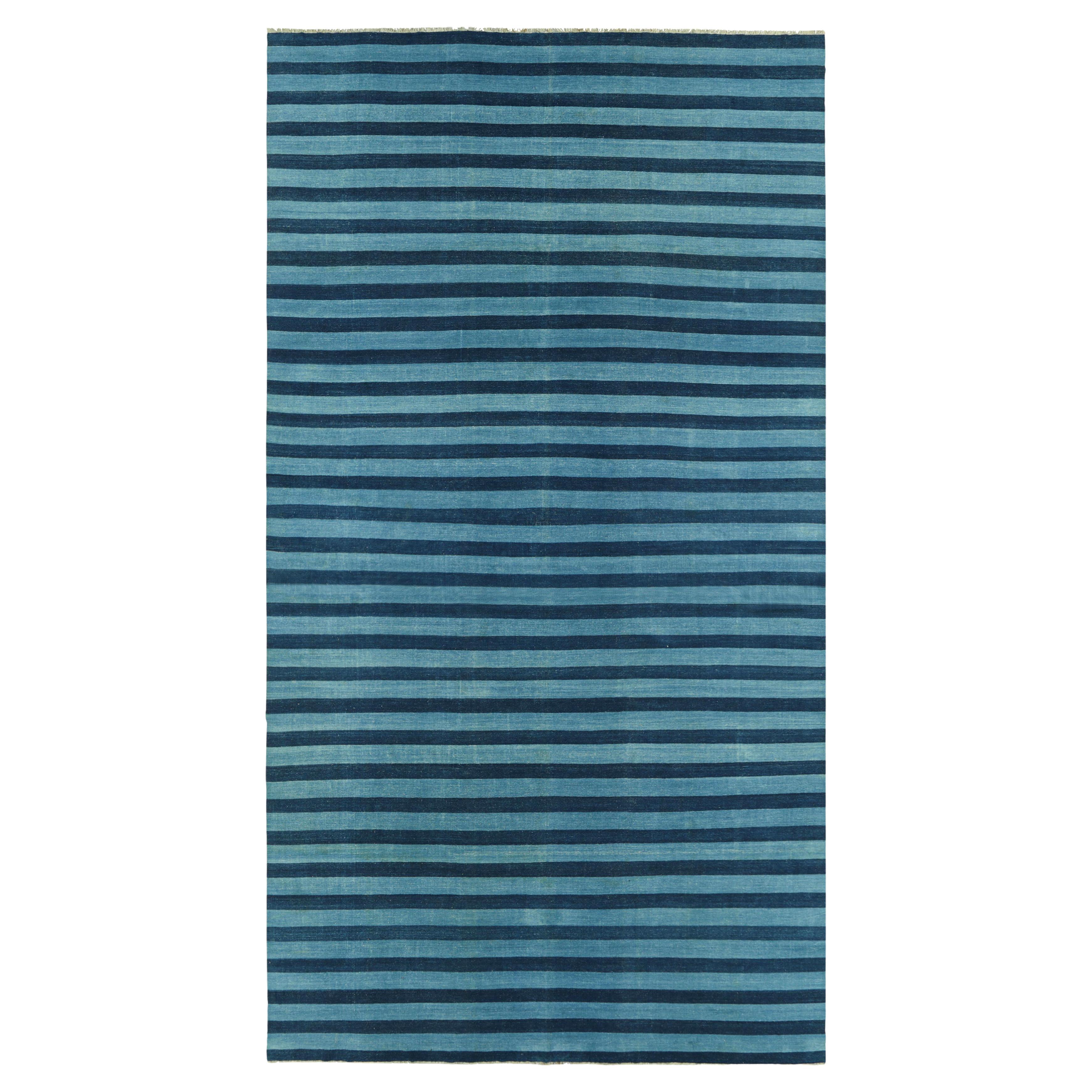 Rug & Kilim’s Oversized Contemporary Dhurrie Rug in Blue Stripes