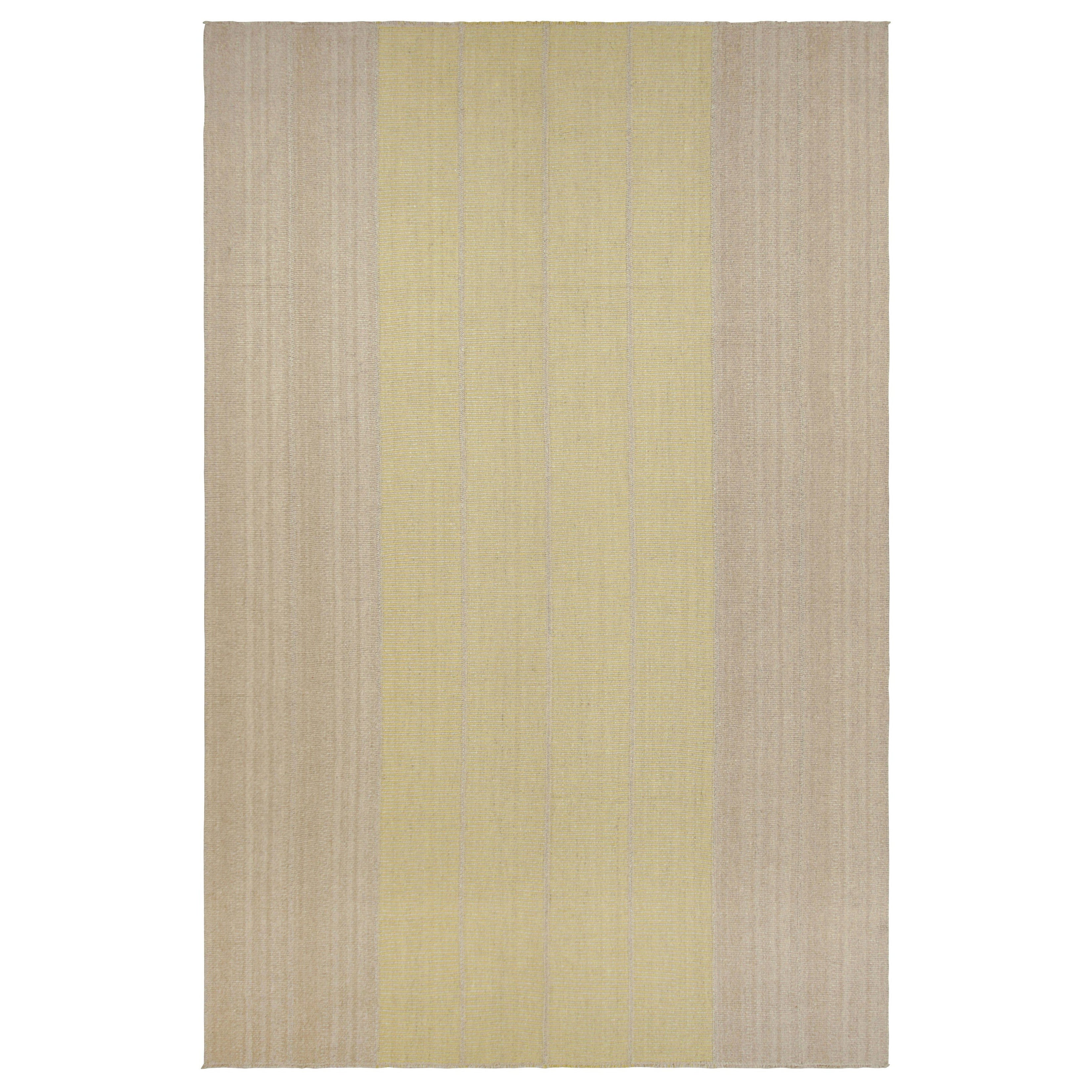 Kilim contemporáneo sobredimensionado de Rug
Kilim con rayas beige y doradas texturadas