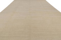 Rug & Kilim’s Oversized Contemporary Textural Solid Rug in Beige Tones