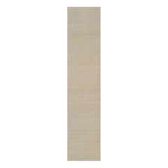 Rug & Kilim’s Oversized Contemporary Textural Solid Rug in Beige Tones