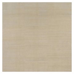 Rug & Kilim’s Oversized Contemporary Textural Solid Rug in Beige Tones
