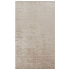 Rug 
Kilim’s Oversized Contemporary Textural Solid Rug in Beige Tones