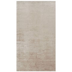 Rug 
Kilim’s Oversized Contemporary Textural Solid Rug in Beige Tones