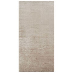 Rug & Kilim’s Oversized Contemporary Textural Solid Rug in Beige Tones