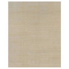 Rug & Kilim’s Oversized Contemporary Textural Solid Rug in Beige Tones