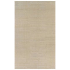 Rug & Kilim’s Oversized Contemporary Textural Solid Rug in Beige Tones