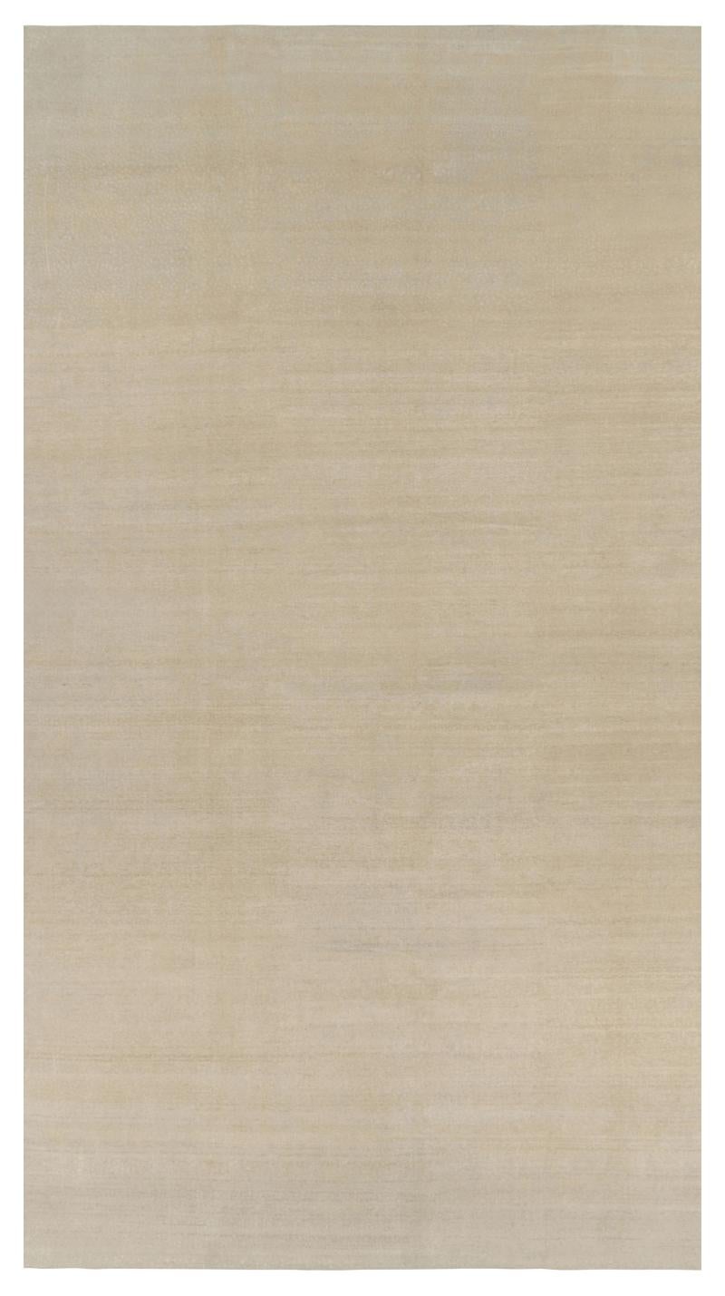 Rug & Kilim’s Oversized Contemporary Textural Solid Rug in Beige Tones