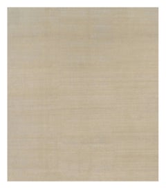 Alfombra contemporánea sobredimensionada de textura sólida en tonos beige de Rug & Kilim