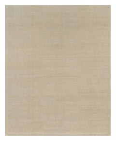 Alfombra contemporánea sobredimensionada de textura sólida en tonos beige de Rug & Kilim