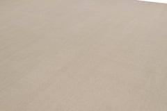 Rug & Kilim’s Oversized Contemporary Textural Solid Rug in Cream and White Tones