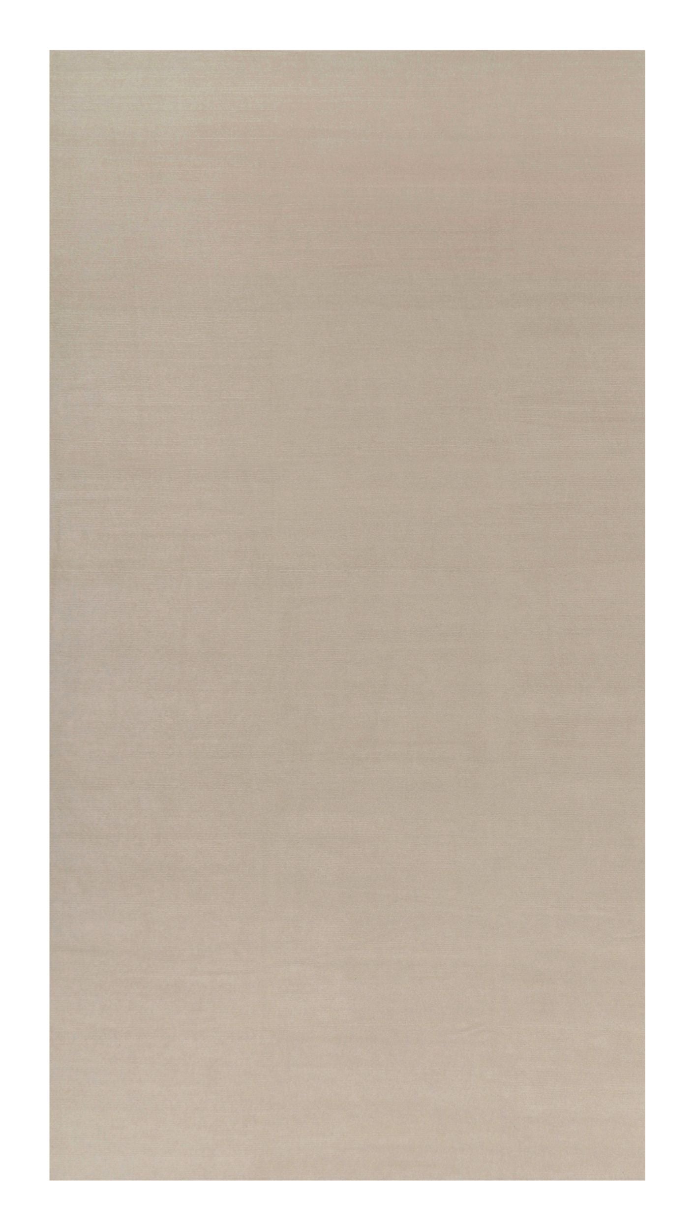 Rug & Kilim’s Oversized Contemporary Textural Solid Rug in Cream and White Tones