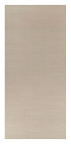 Rug & Kilim’s Oversized Contemporary Textural Solid Rug in Cream and White Tones