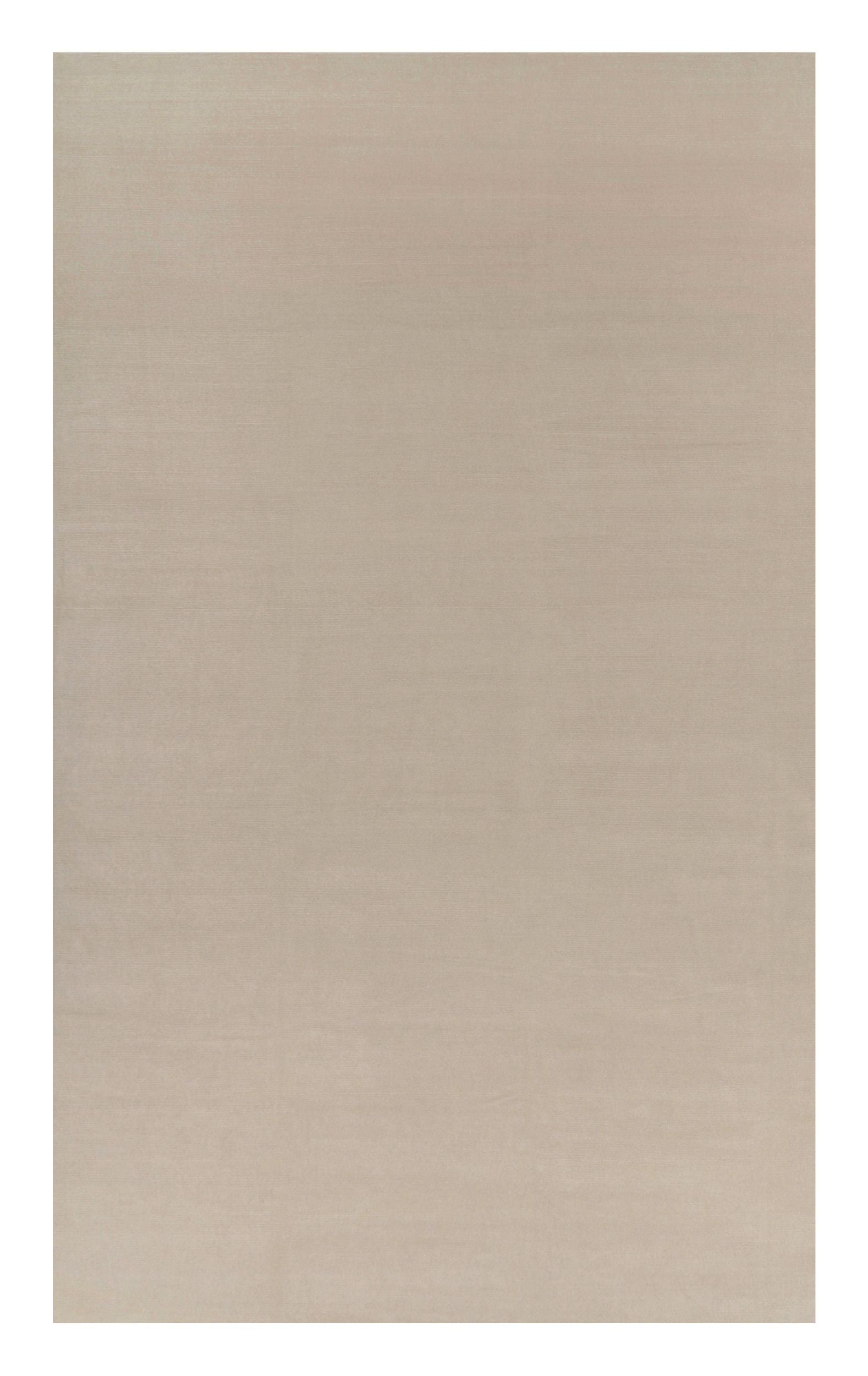 Rug & Kilim’s Oversized Contemporary Textural Solid Rug in Cream and White Tones