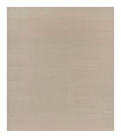 Rug & Kilim’s Oversized Contemporary Textural Solid Rug in Cream and White Tones