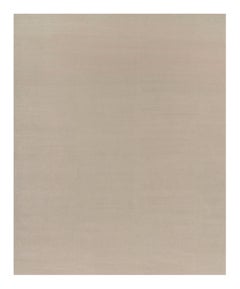 Rug & Kilim’s Oversized Contemporary Textural Solid Rug in Cream and White Tones
