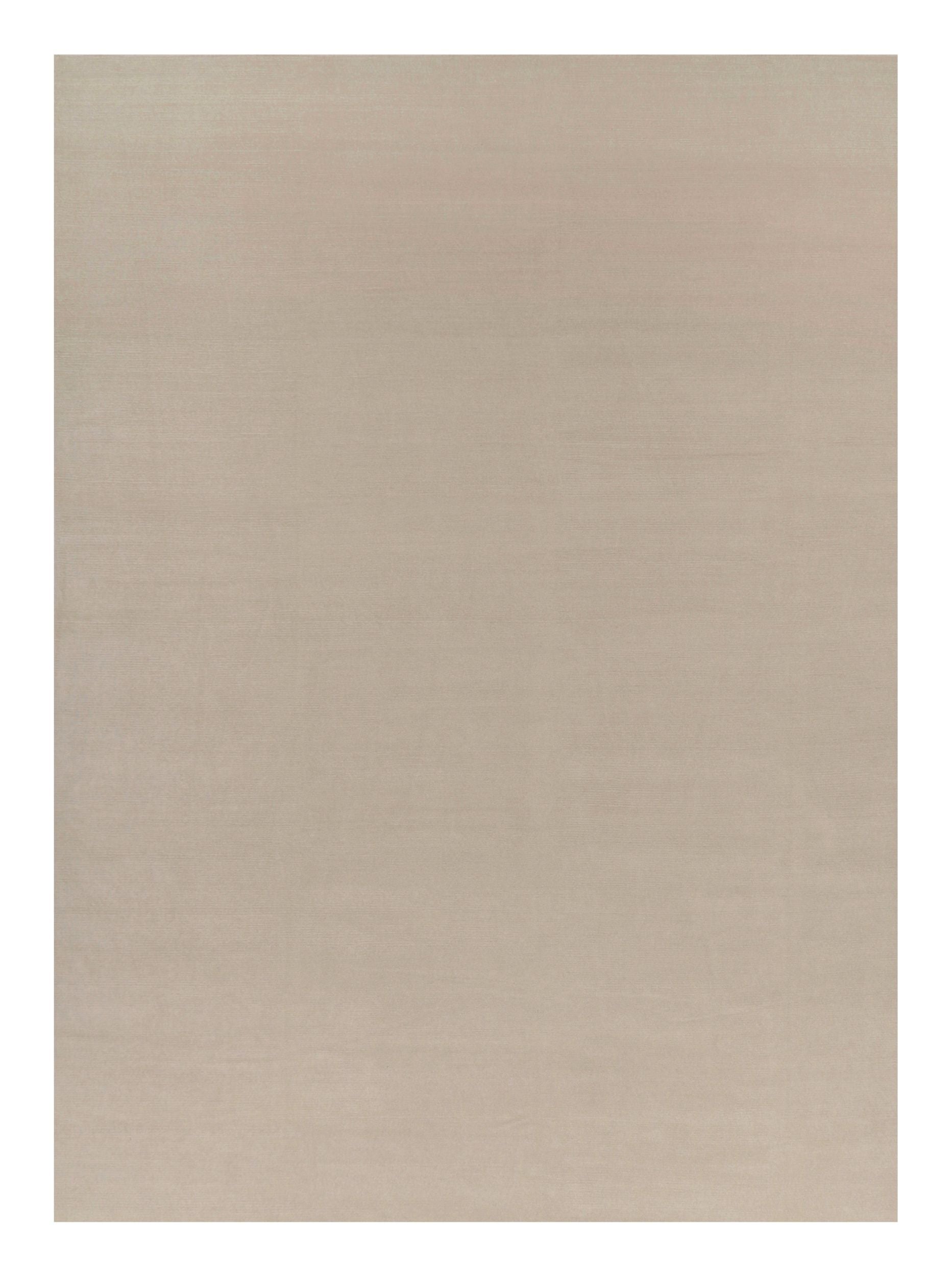 Rug & Kilim’s Oversized Contemporary Textural Solid Rug in Cream and White Tones
