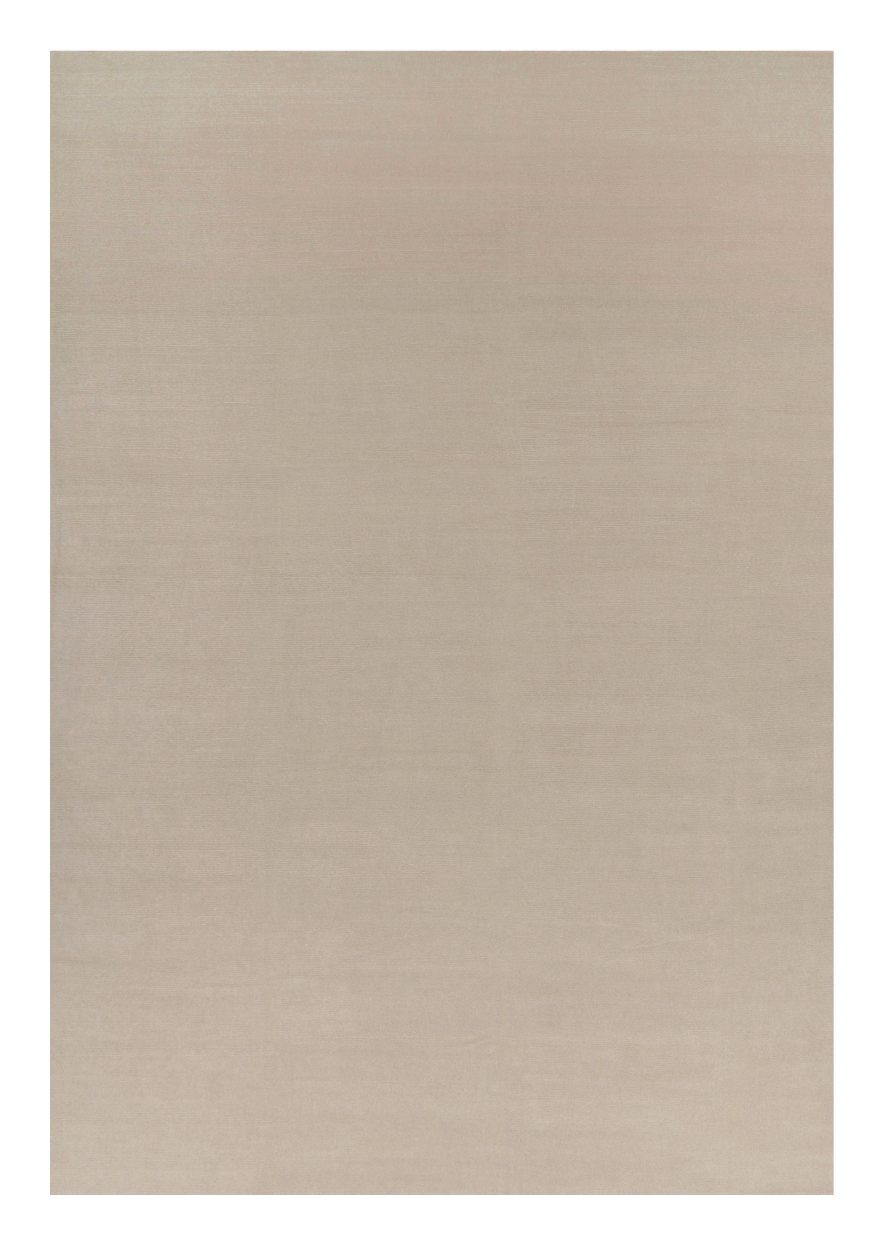 Rug & Kilim’s Oversized Contemporary Textural Solid Rug in Cream and White Tones