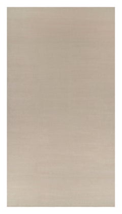 Rug & Kilim’s Oversized Contemporary Textural Solid Rug in Cream and White Tones