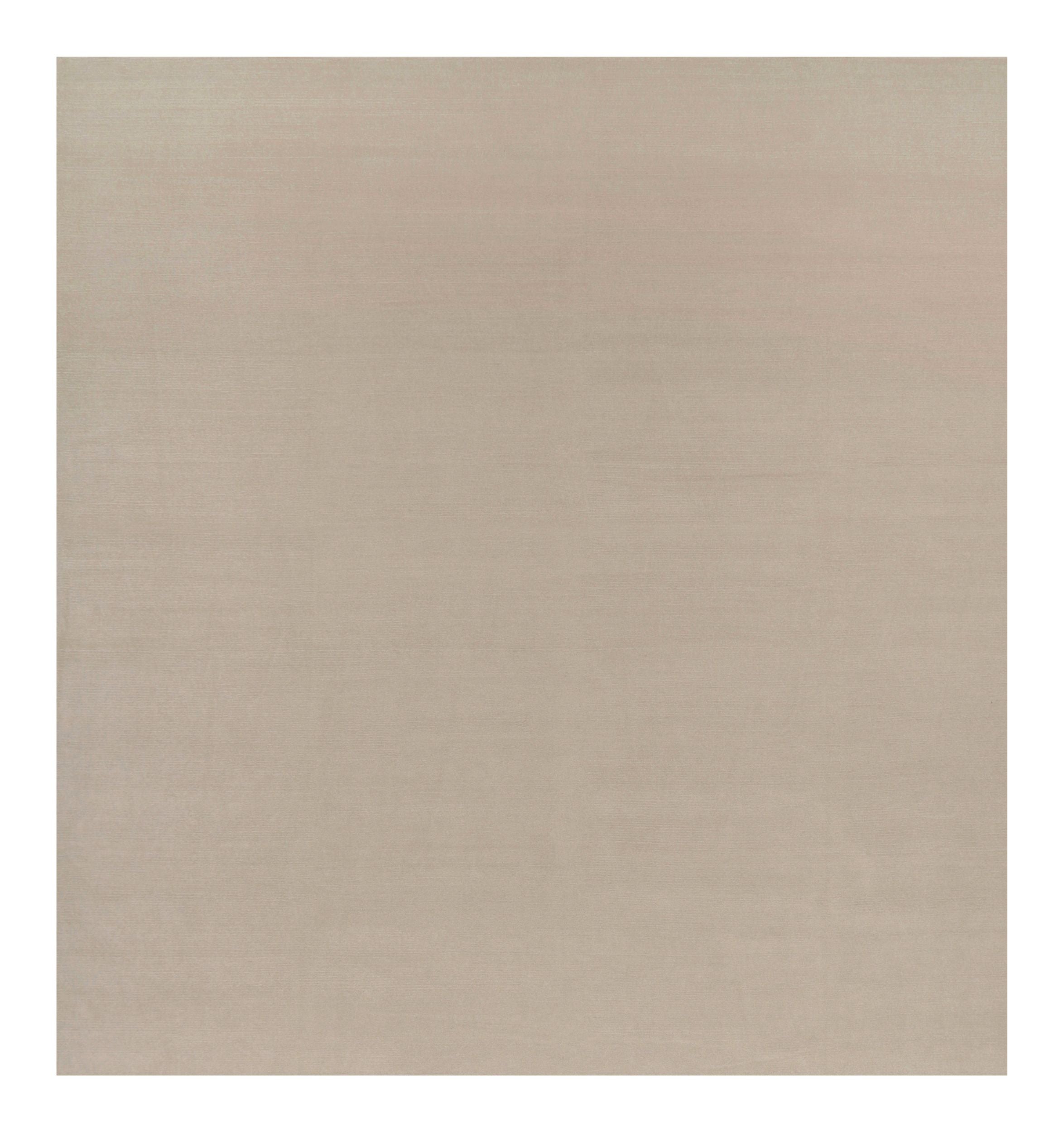 Rug & Kilim’s Oversized Contemporary Textural Solid Rug in Cream and White Tones