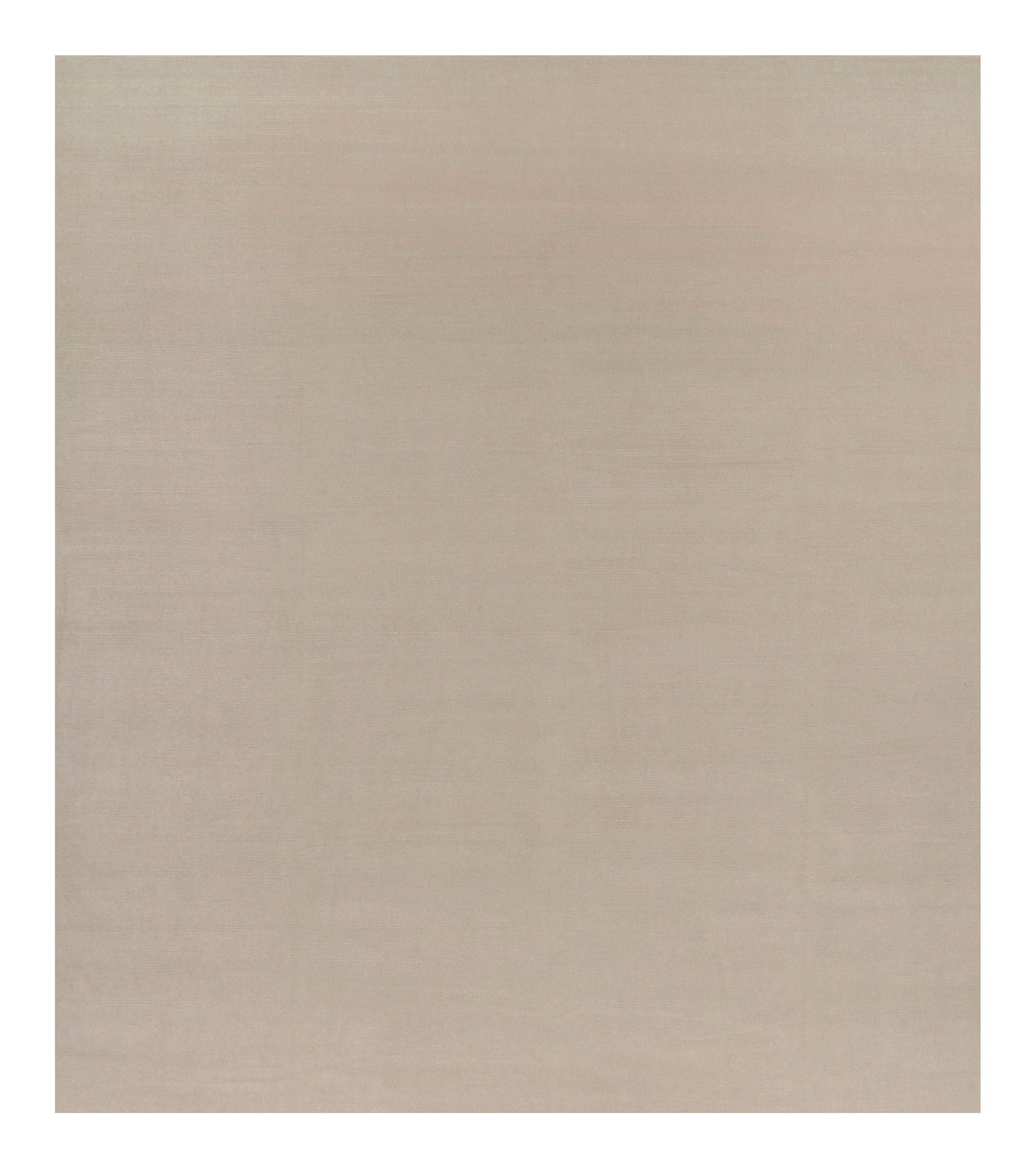 Rug & Kilim’s Oversized Contemporary Textural Solid Rug in Cream and White Tones