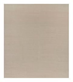 Rug & Kilim’s Oversized Contemporary Textural Solid Rug in Cream and White Tones