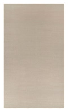 Rug & Kilim’s Oversized Contemporary Textural Solid Rug in Cream and White Tones