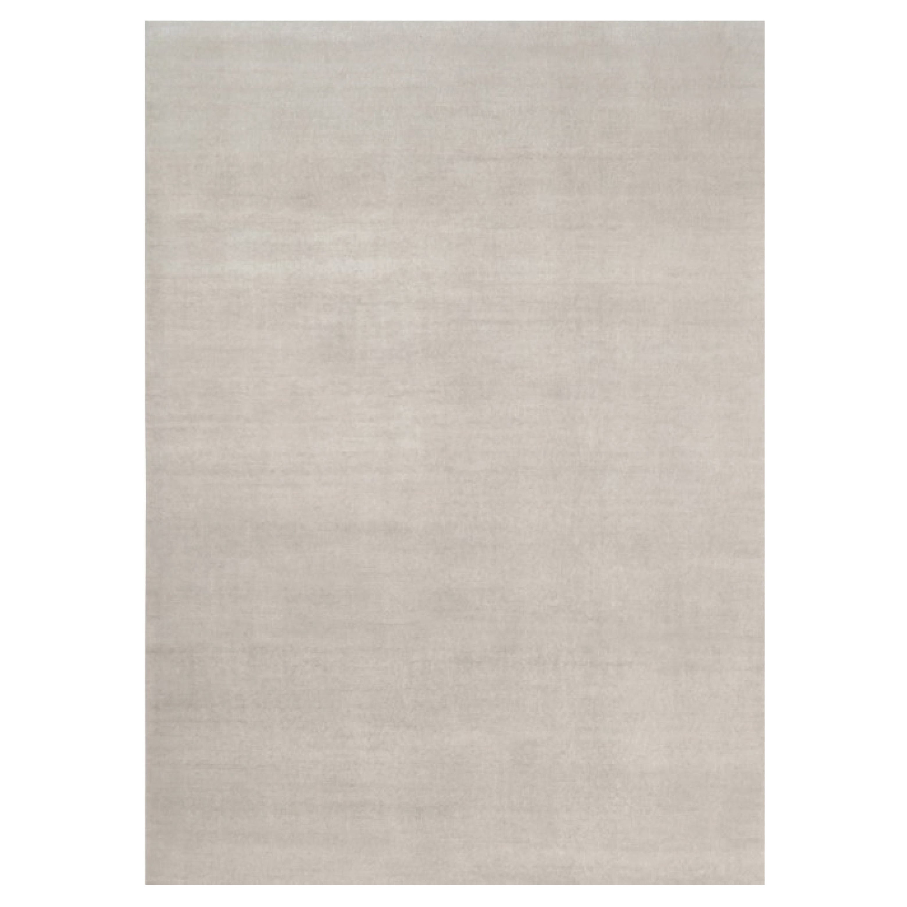 Rug & Kilim’s Oversized Contemporary Textural Solid Rug in Ivory Tones