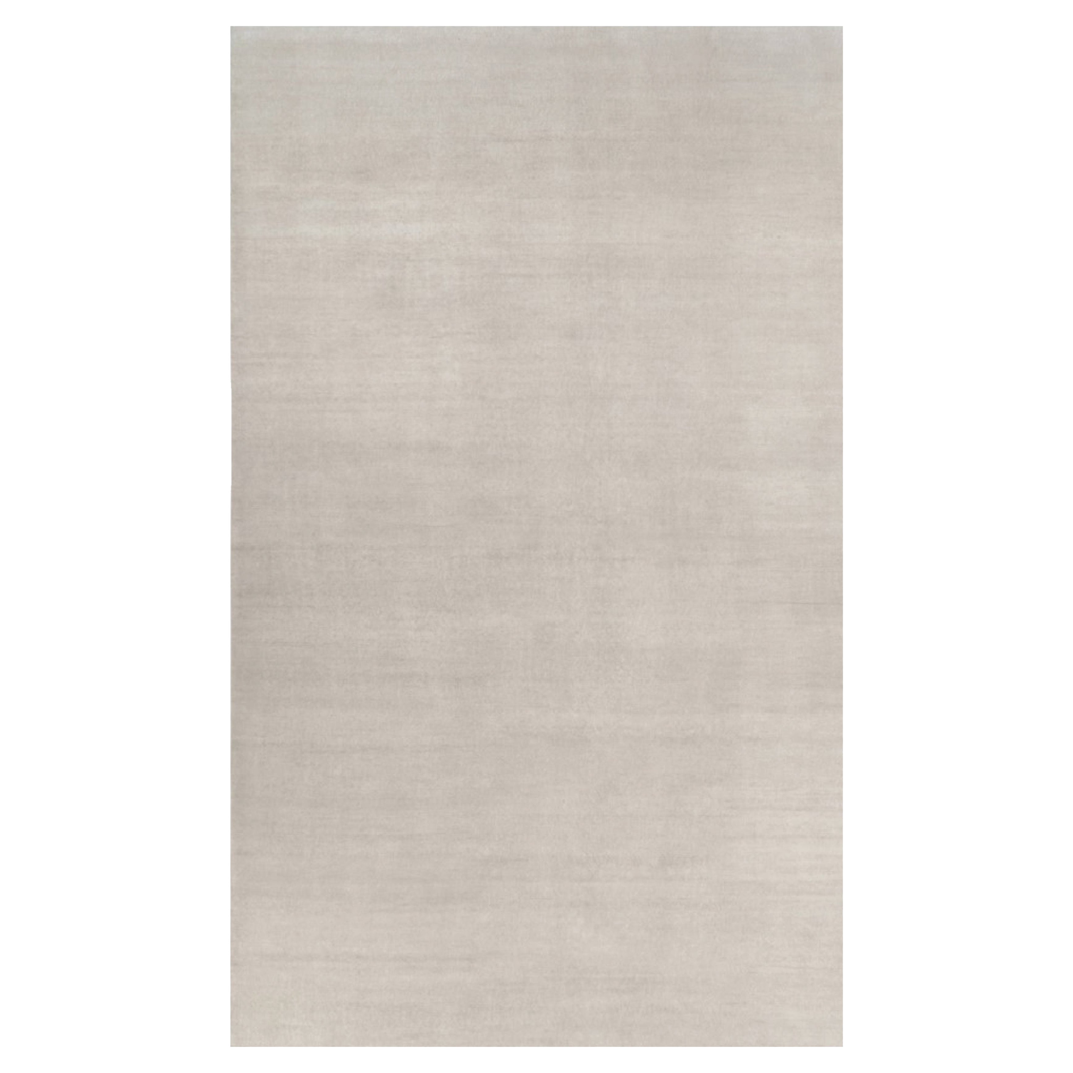 Rug & Kilim’s Oversized Contemporary Textural Solid Rug in Ivory Tones