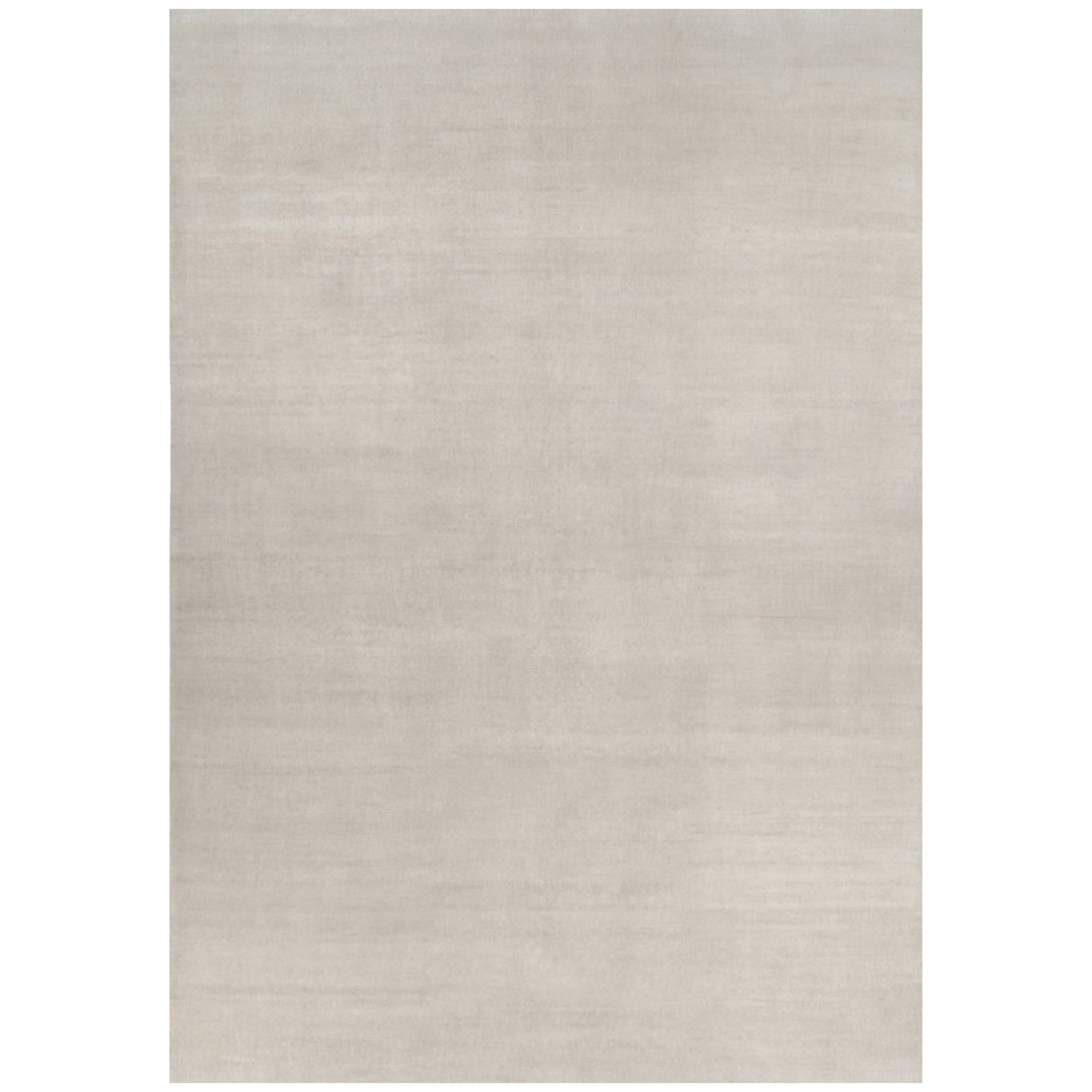 Rug 
Kilim’s Oversized Contemporary Textural Solid Rug in Ivory Tones
