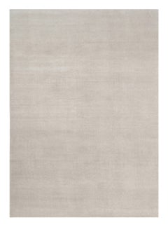 Alfombra sólida de textura contemporánea sobredimensionada en tonos marfil de Rug & Kilim