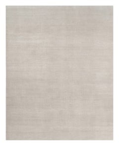Alfombra sólida de textura contemporánea sobredimensionada en tonos marfil de Rug & Kilim