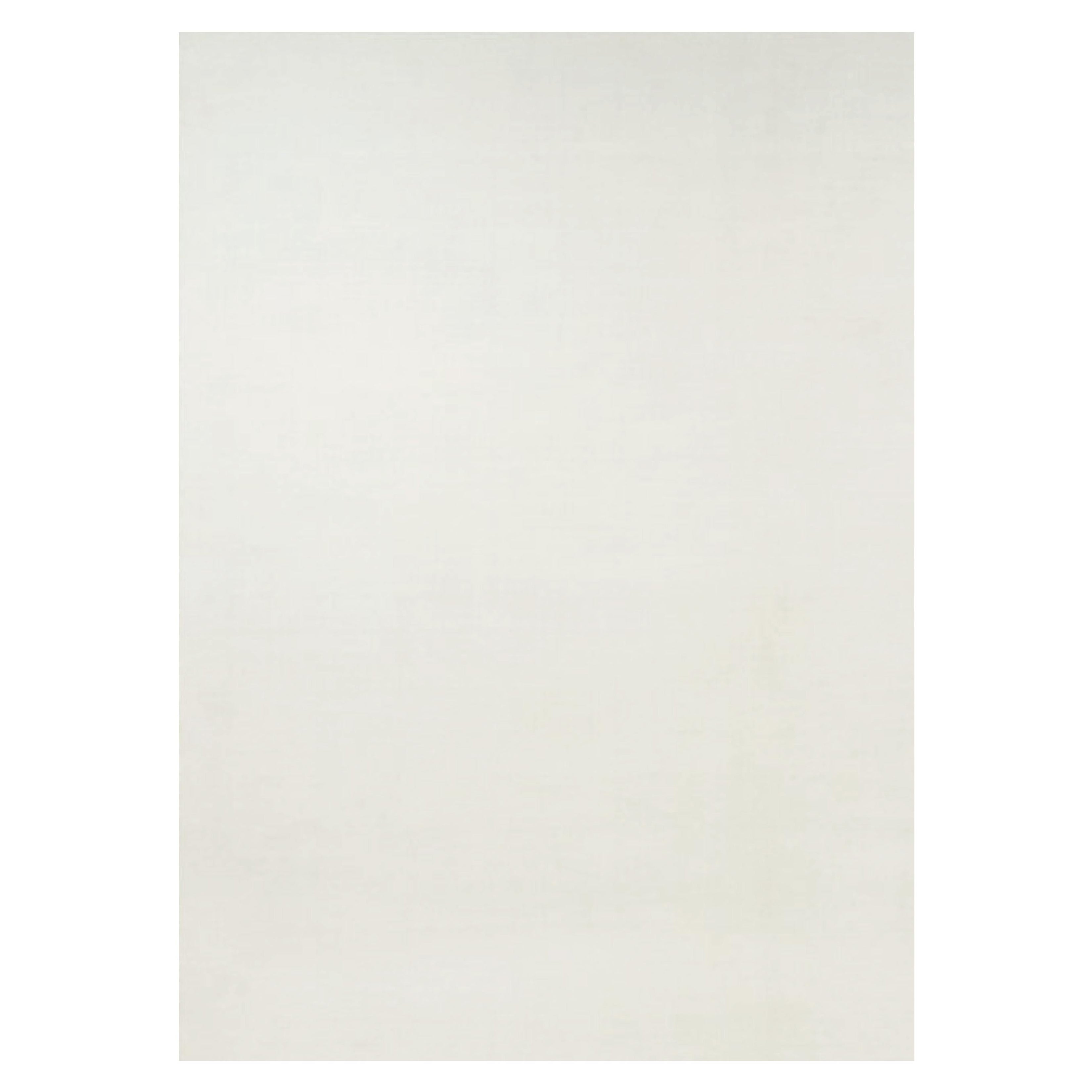 Rug & Kilim’s Oversized Contemporary Textural Solid Rug in White Tones