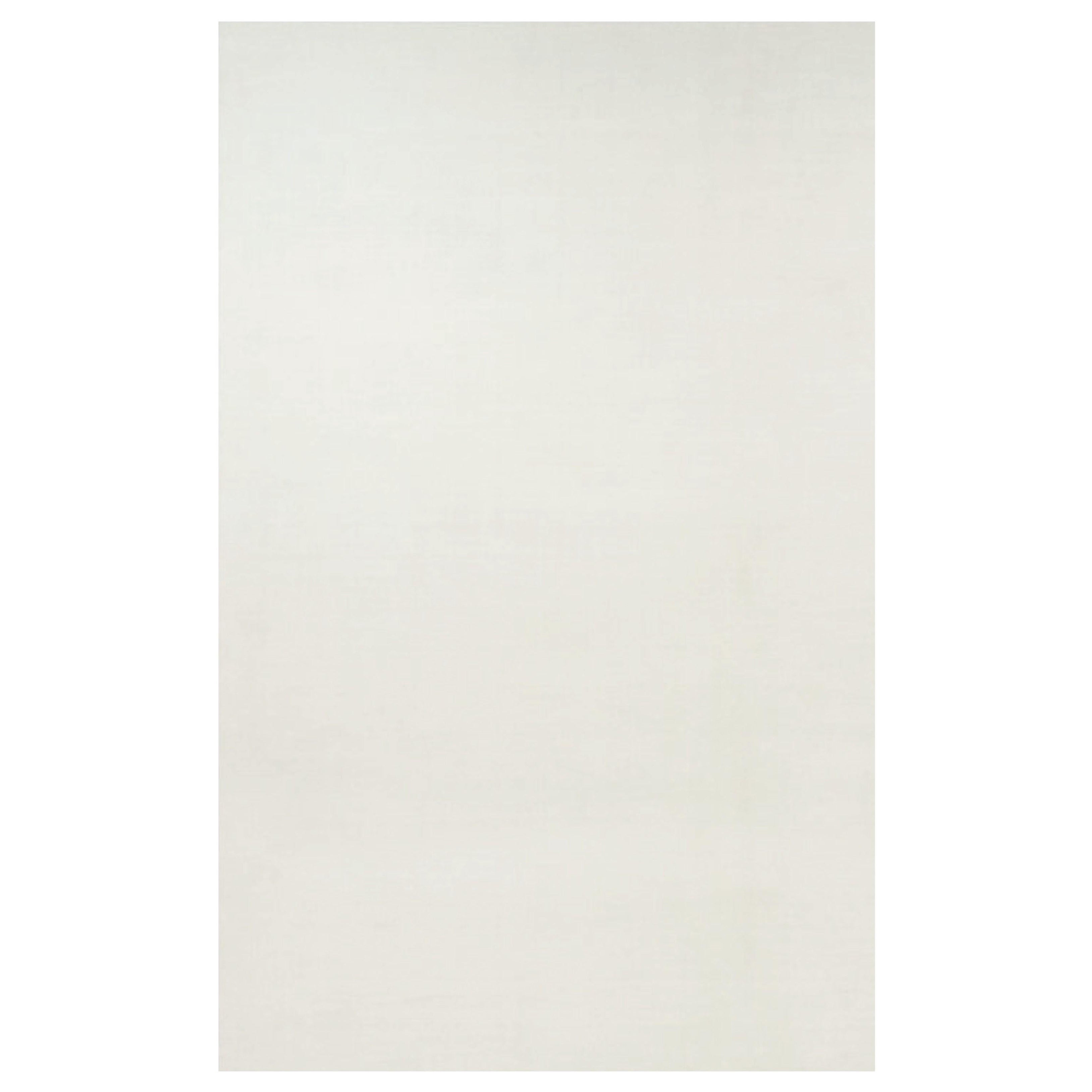 Rug 
Kilim’s Oversized Contemporary Textural Solid Rug in White Tones