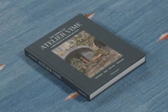 Rug & Kilim’s Oversized Custom Dhurrie Rug in Blue and Rust Geometric Patterns