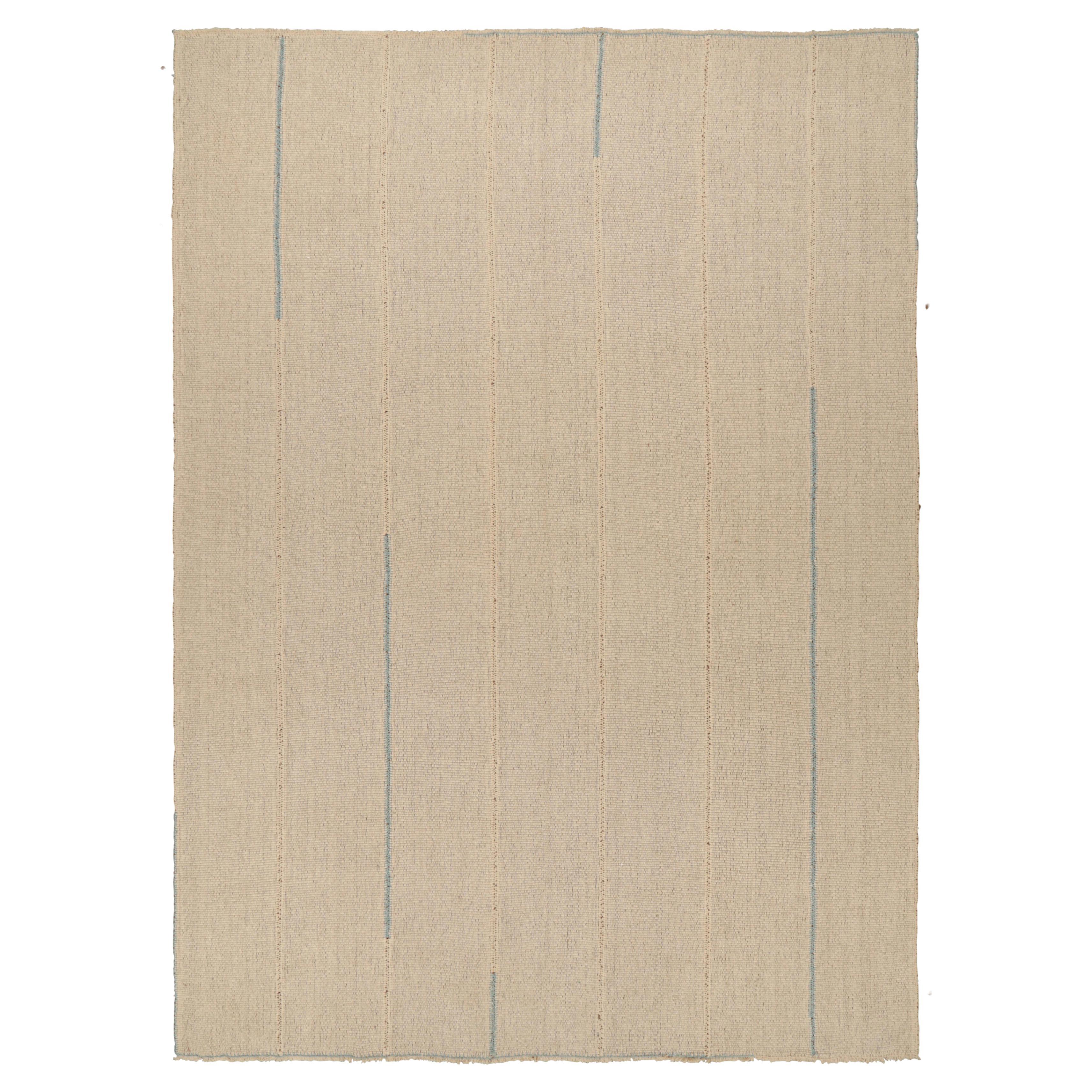 Rug & Kilim’s Oversized Kilim in Beige Textural Stripes and Blue Accents