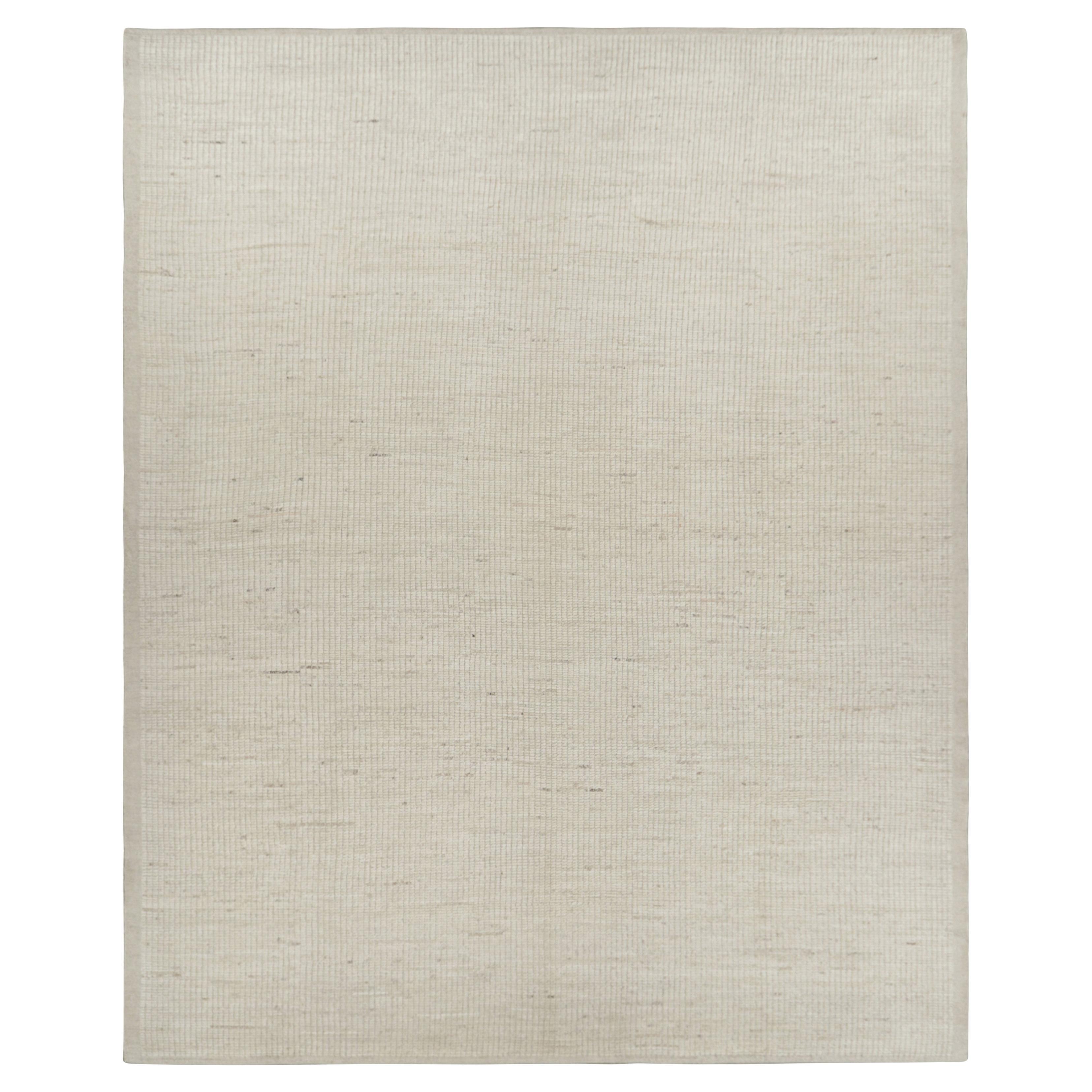 Rug 
Kilim è un kilim sovradimensionato con strisce e striature testuali beige e bianche.